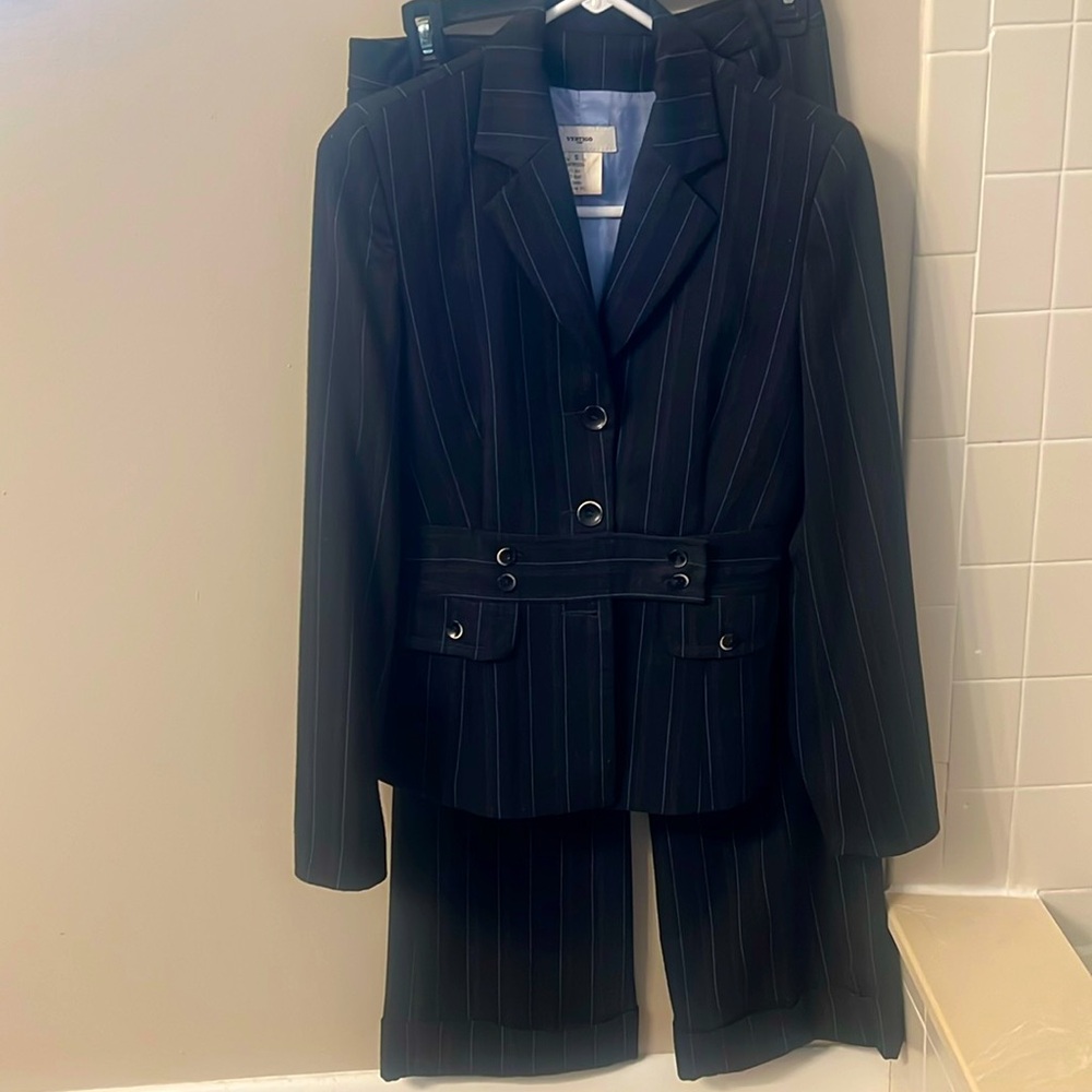 Vertigo suite with jacket and matching slacks. Cuffed pantss with belt loops.